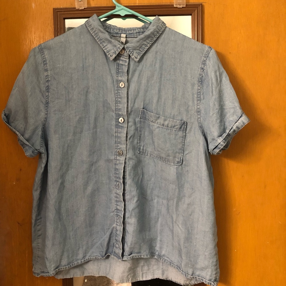 Light blue short sleeve button up.